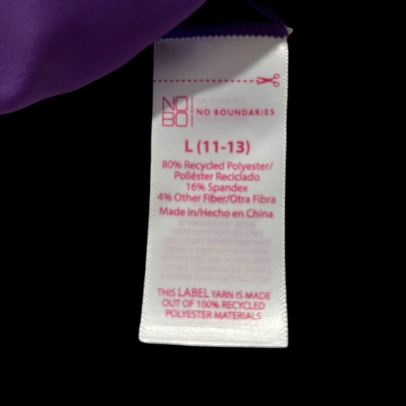 A No Boundries bikini that is reversible and can be pink or purple or a combo - Picture 4 of 10